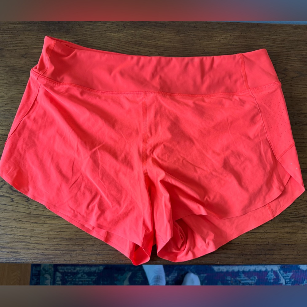 Neon coral athleta shorts!! Great color. Barely worn.